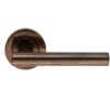 Manital Calla Door Handles On Round Rose, Dark Bronze (sold in pairs)