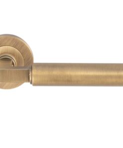 Amiata Door Handles On Round Rose, Antique Brass (sold in pairs)