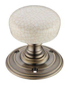 Ivory Crackle Glaze Porcelain Door Knobs, Florentine Bronze  (sold in pairs)