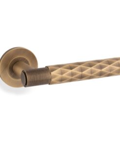 Alexander & Wilks Diamond Cut Spitfire Door Handles On Round Rose (sold in pairs)