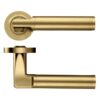 Milan lever on round rose Favo Satin Brass