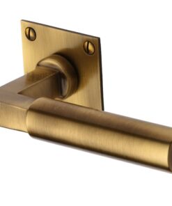 Heritage Brass Bauhaus Low Profile Antique Brass Door Handles On Square Rose (sold in pairs)