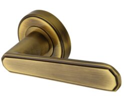 Heritage Brass Century Art Deco Style Door Handles On Round Rose, Antique Brass  (sold in pairs)