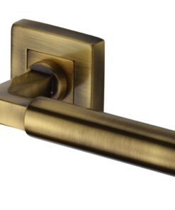 Heritage Brass Bauhaus SQ Antique Brass Door Handles On Square Rose (sold in pairs)