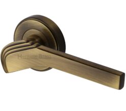 Heritage Brass Tiffany Art Deco Style Door Handles On Round Rose, Antique Brass  (sold in pairs)