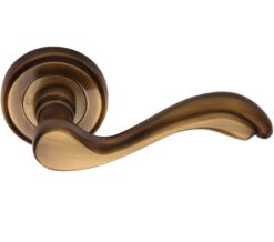 Heritage Brass Lisboa Antique Brass Door Handles On Round Rose