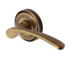 Heritage Brass Sophia Antique Brass Door Handles On Round Rose   (sold in pairs)