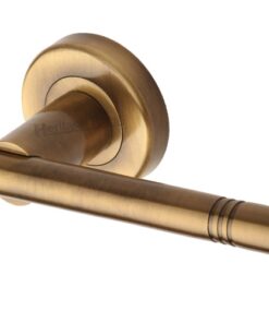 Heritage Brass Alicia Antique Brass Door Handles On Round Rose (sold in pairs)