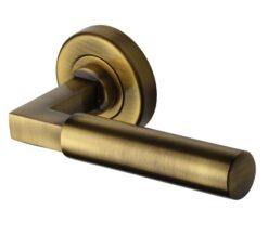 Heritage Brass Bauhaus Antique Brass Door Handles On Round Rose