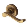 Heritage Brass Bedford Antique Brass Door Handles On Round Rose   (sold in pairs)