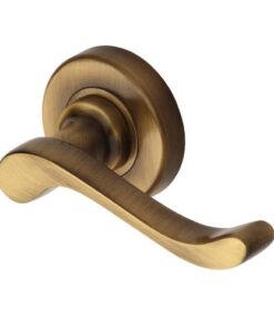 Heritage Brass Bedford Antique Brass Door Handles On Round Rose -   (sold in pairs)