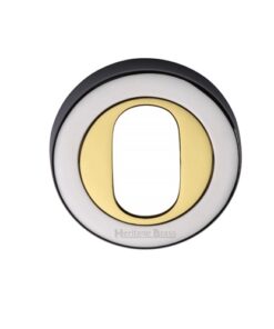 Heritage Brass Oval Profile Key Escutcheon Dual Finish, Polished Chrome With Polished Brass