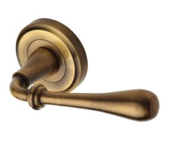 Heritage Brass Roma Antique Brass Door Handles On Round Rose