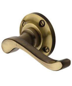 Heritage Brass Bedford Antique Brass Door Handles On Round Rose (sold in pairs)